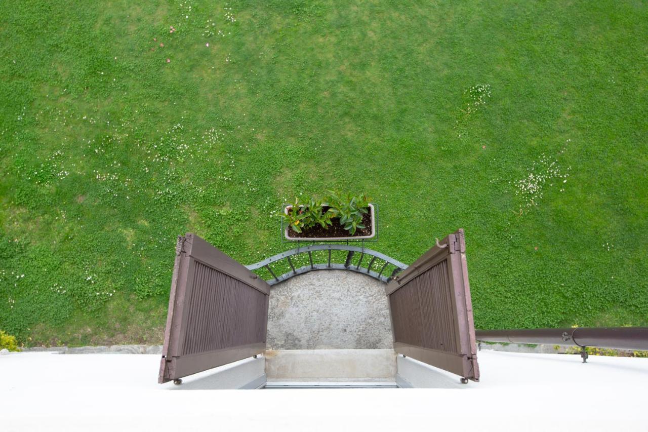 Camera Tripla Classic con Vista Giardino